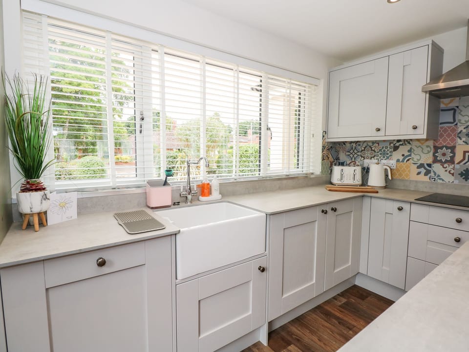 Fridge, dishwasher, electric kettle, cookware/dishes/utensils