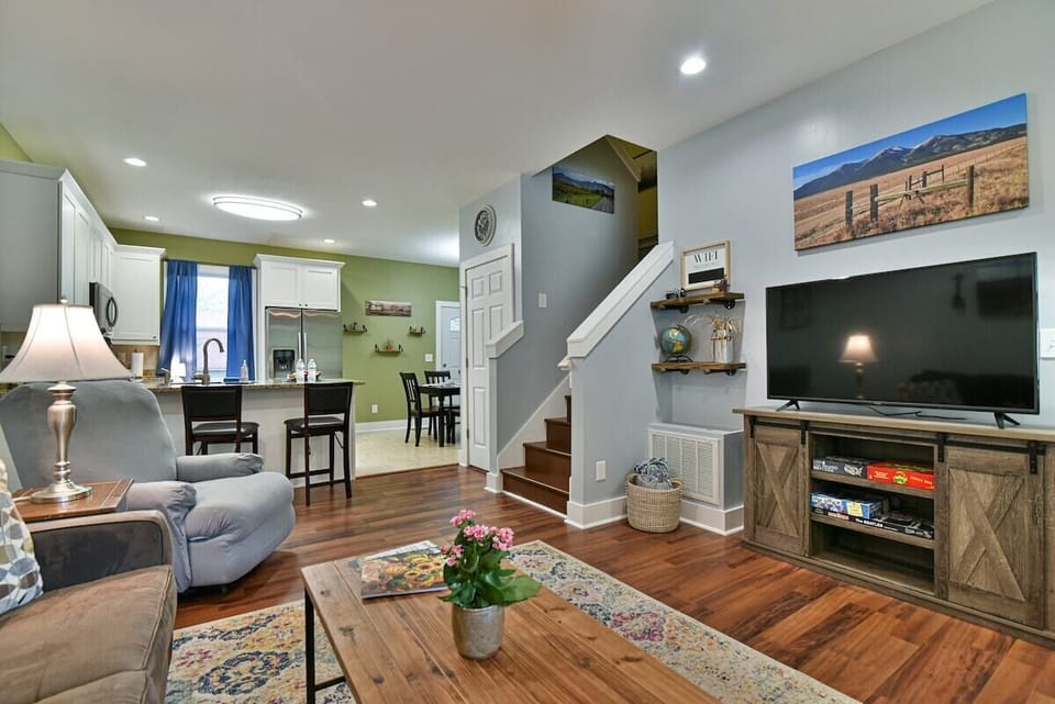 Cozy living room with plenty of seating and a queen size sleeper sofa