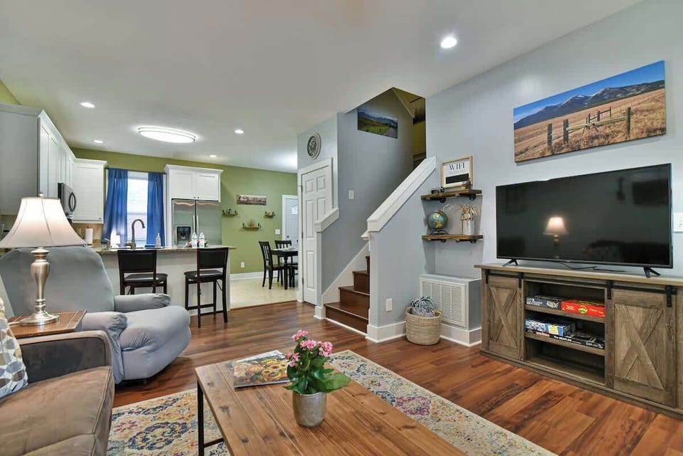 Cozy living room with plenty of seating and a queen size sleeper sofa