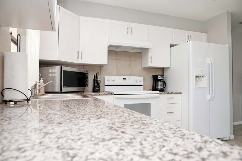 Kitchen- Fridge, Electric Range, Dishwasher, Microwave, Coffee Machine