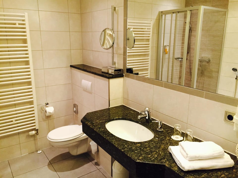 Shower, free toiletries, hair dryer, towels