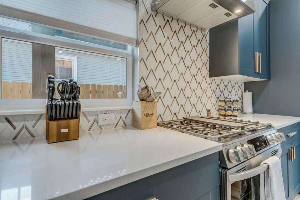 Kitchen Bliss Awaits: Our Fully Equipped Kitchen Comes Complete with All the Amenities and Utensils You Need. It's Fully Stocked for Your Culinary Adventures!