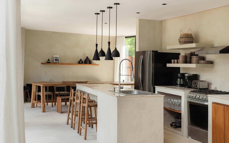 Open kitchen flows effortlessly into the villa's gathering spaces.