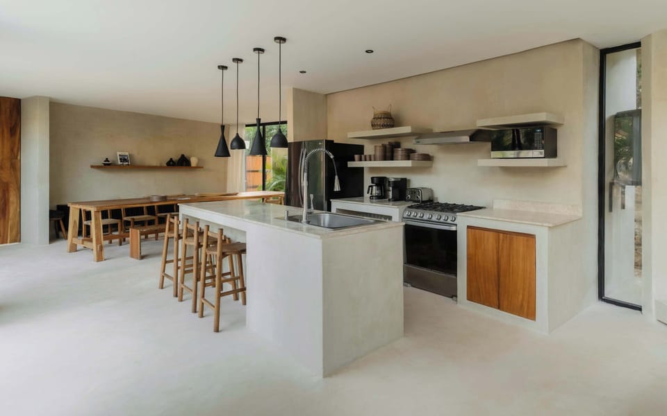Fully equipped kitchen with a generous island for casual dining.