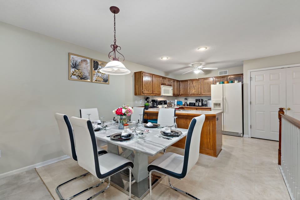 Enjoy family dinners and quality time together at our dining table. 