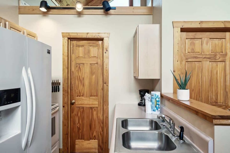 Bright and airy with modern appliances and warm wood accents for delicious culinary adventures!