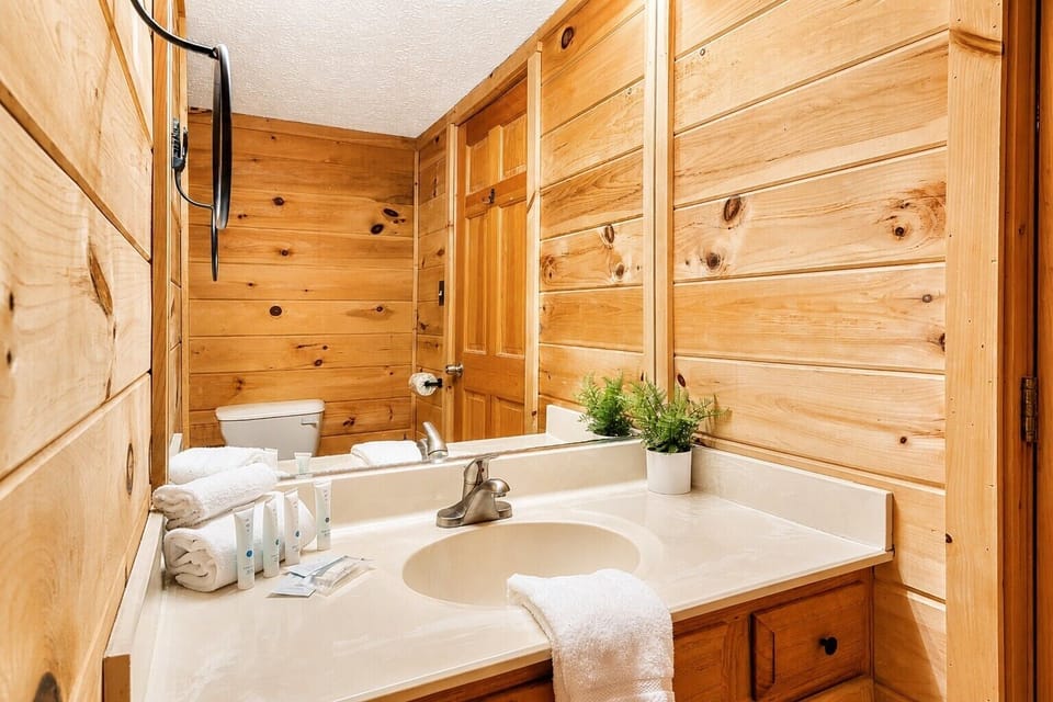 Downstairs bathroom comes with towels, soap, shampoo, and lotion.