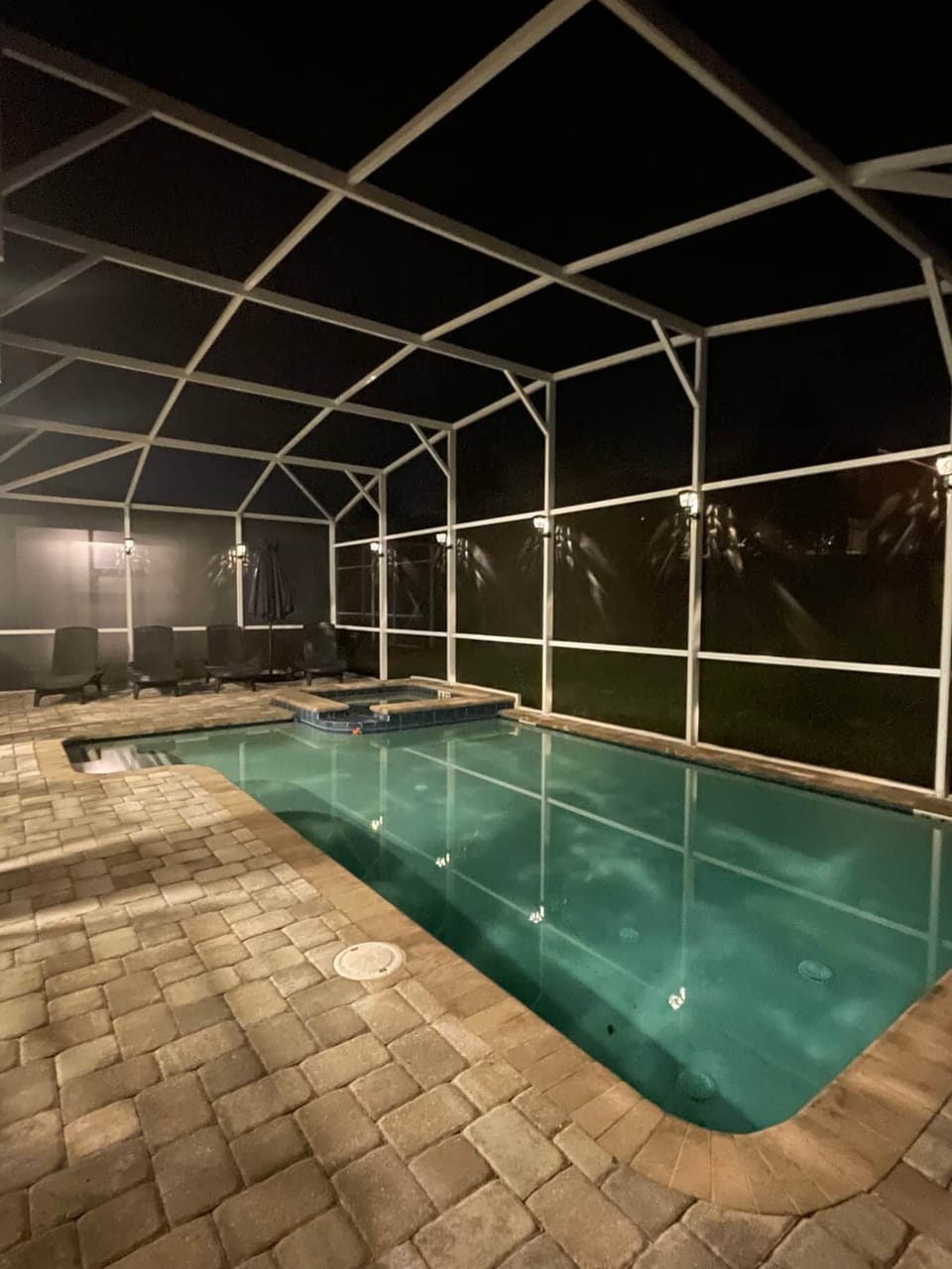 Swim day or night in our covered lighted lanai