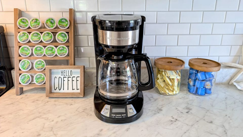 Full coffee bar with a drip pot and a Cuisinart Keurig as well