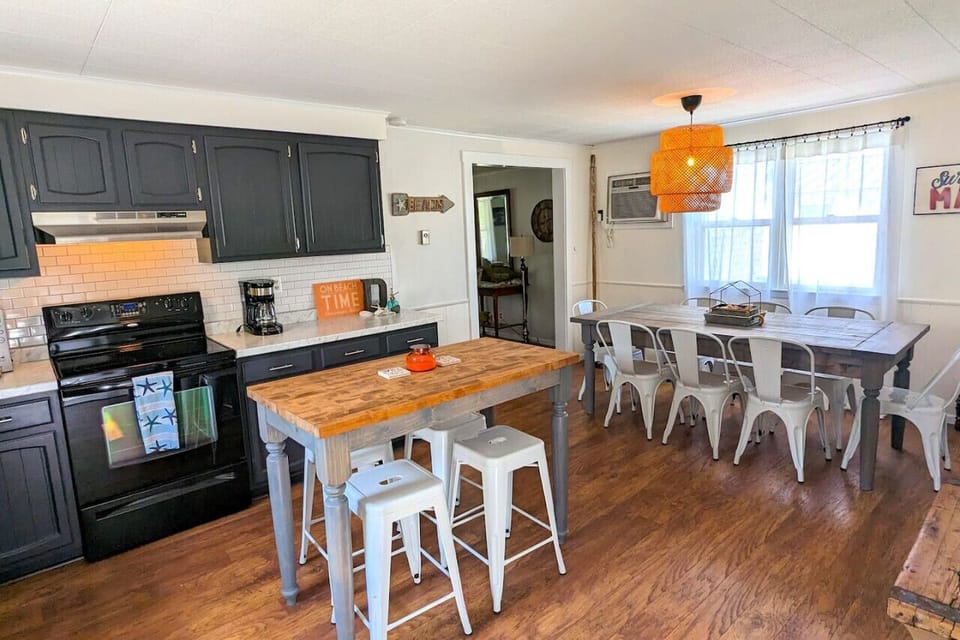 The kitchen is the place to gather. Plenty of places to sit and hangout.