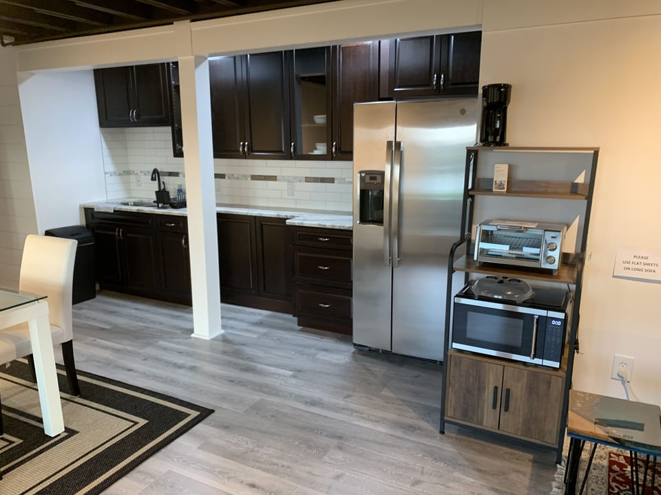 KITCHENETTE, MICROWAVE, COFFEE MAKER ( K CUP OR BREWED), TOASTER OVEN