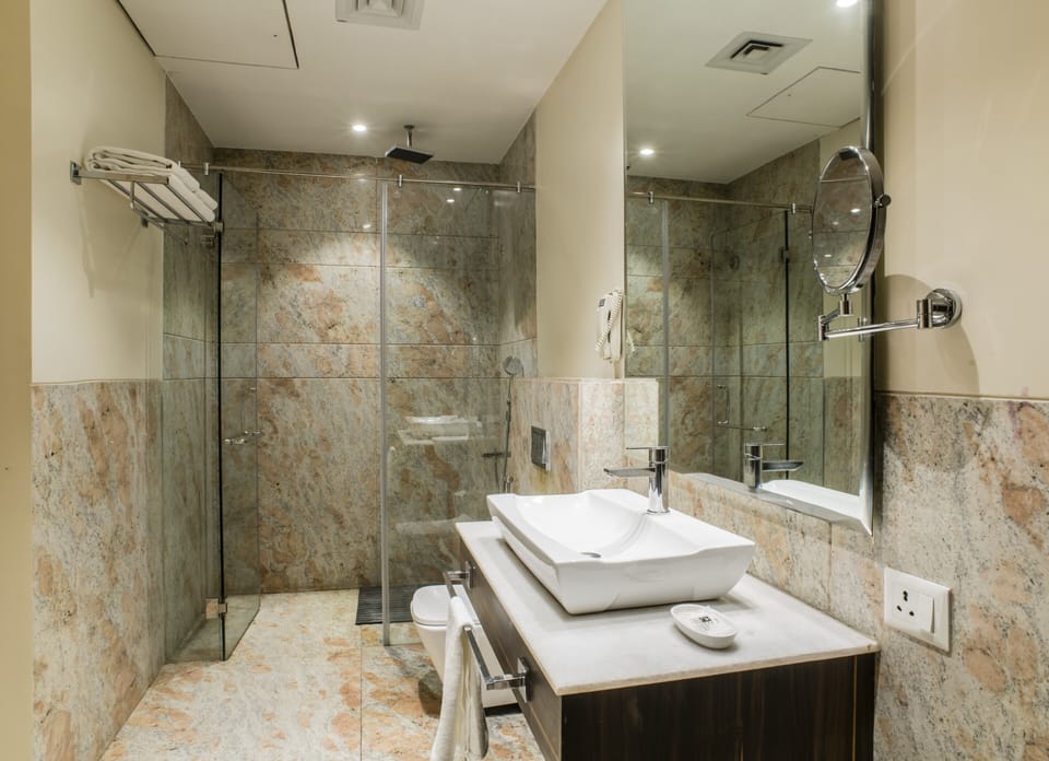 Shower, rainfall showerhead, towels
