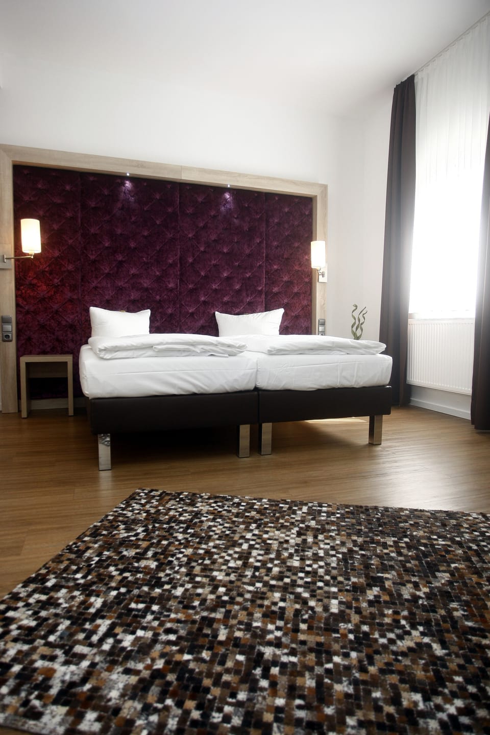 Hypo-allergenic bedding, down comforters, minibar, in-room safe