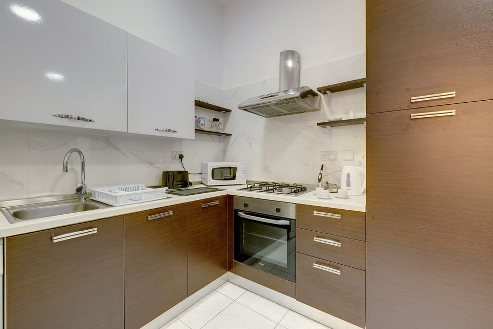 Apartment (1 Bedroom) | Private kitchen | Microwave, oven, espresso maker, electric kettle