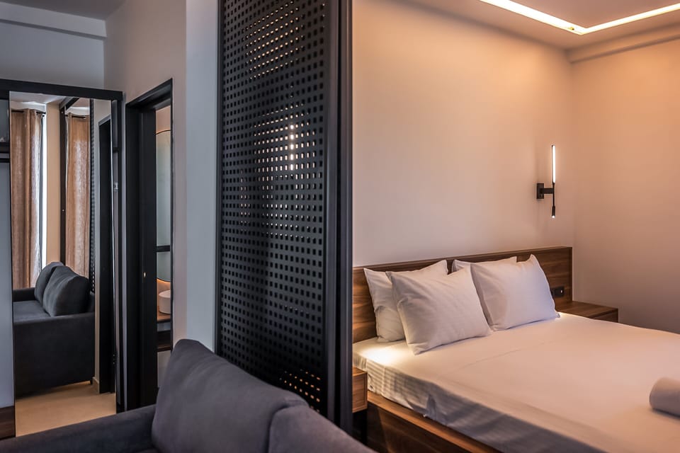 Superior Double Room-Sharing Pool - Sea View | Living area | 43-inch Smart TV with satellite channels, TV, Netflix