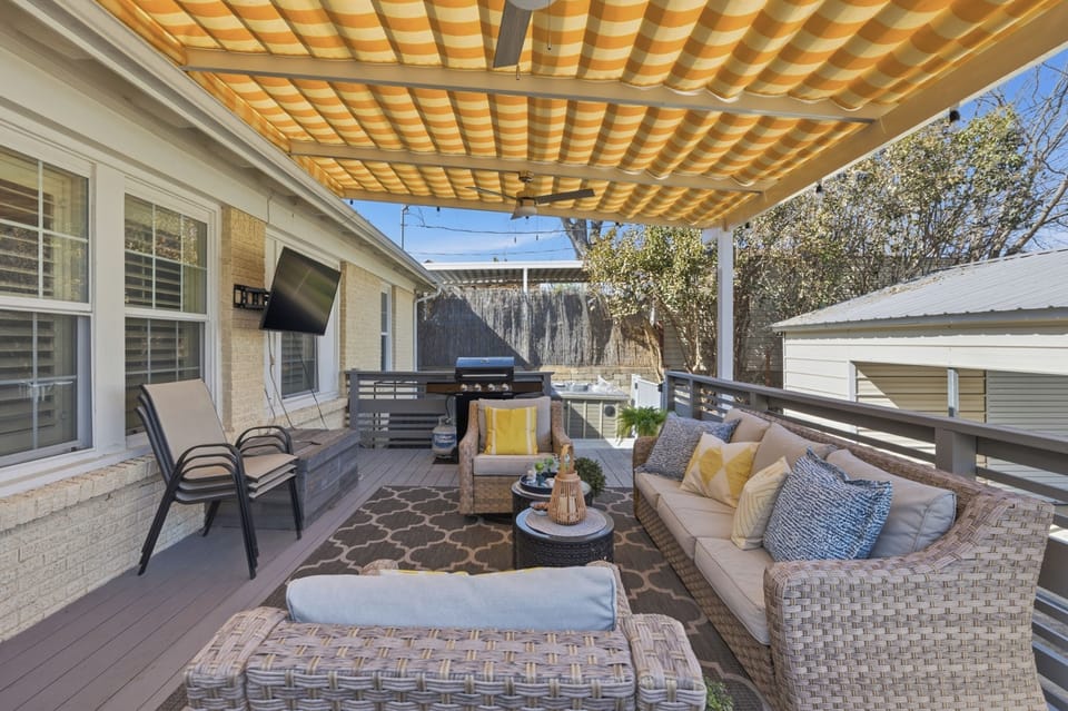 The back porch offers ample room and extra seating for your whole group. Fire up the gas BBQ grill, catch a show on the outdoor TV, and enjoy the breeze from the overhead ceiling fan.