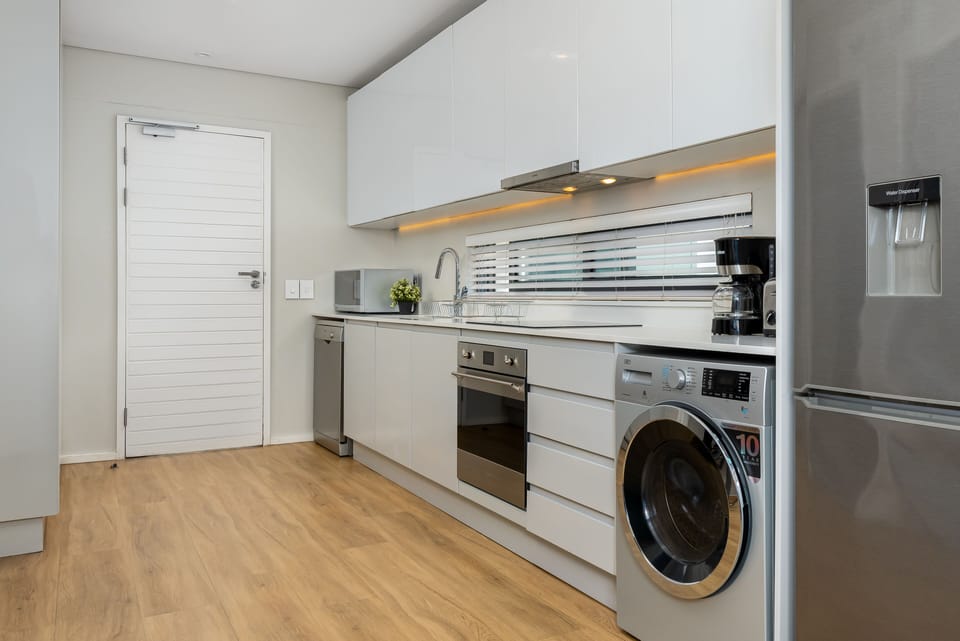 Classic Apartment | Private kitchen | Fridge, microwave, oven, stovetop