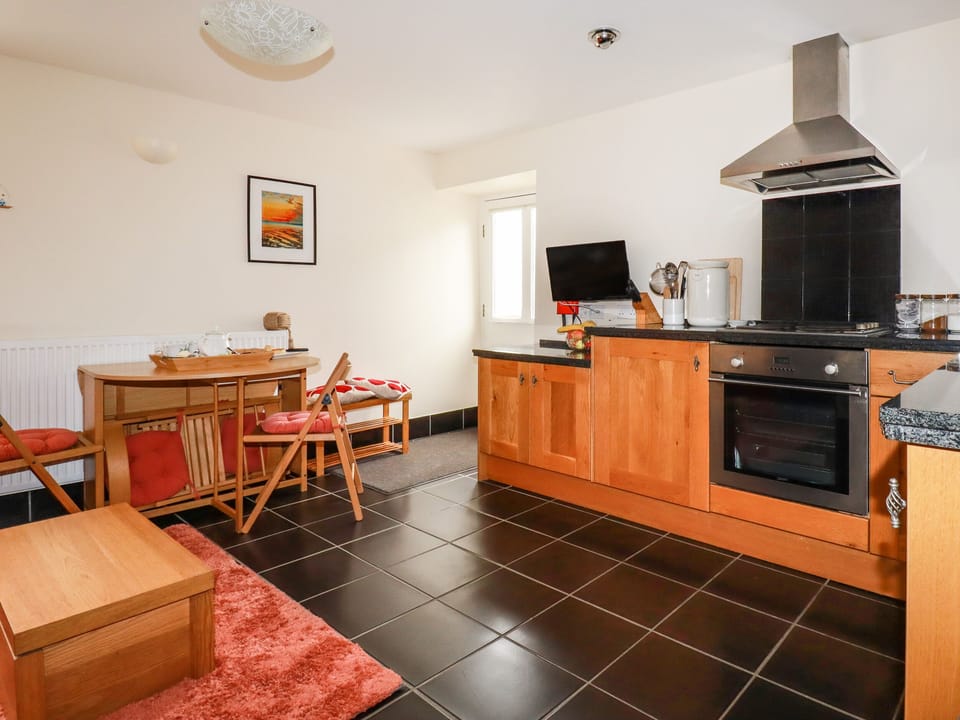 Fridge, electric kettle, toaster, cookware/dishes/utensils