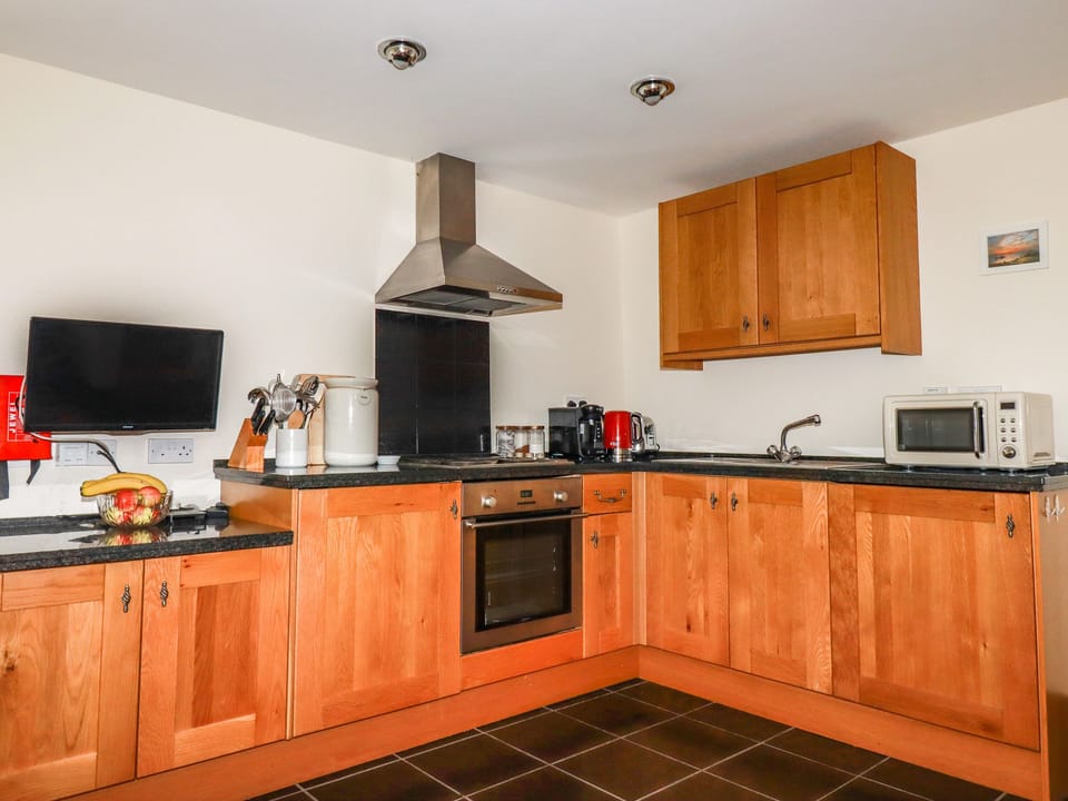 Fridge, electric kettle, toaster, cookware/dishes/utensils