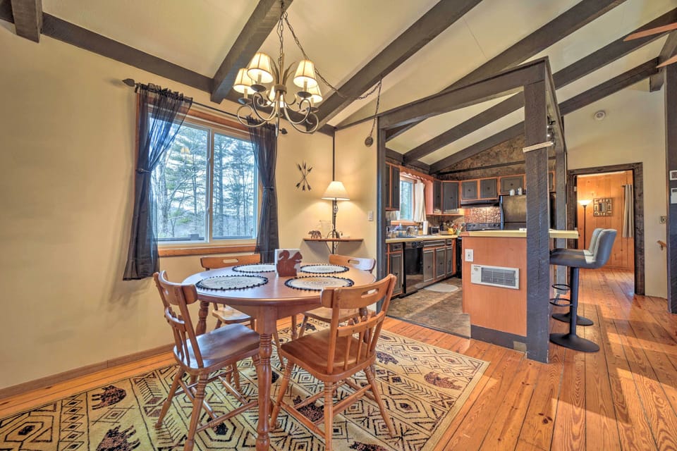 Dining Area | Dishware & Flatware Provided | Breakfast Bar w/ Additional Seating