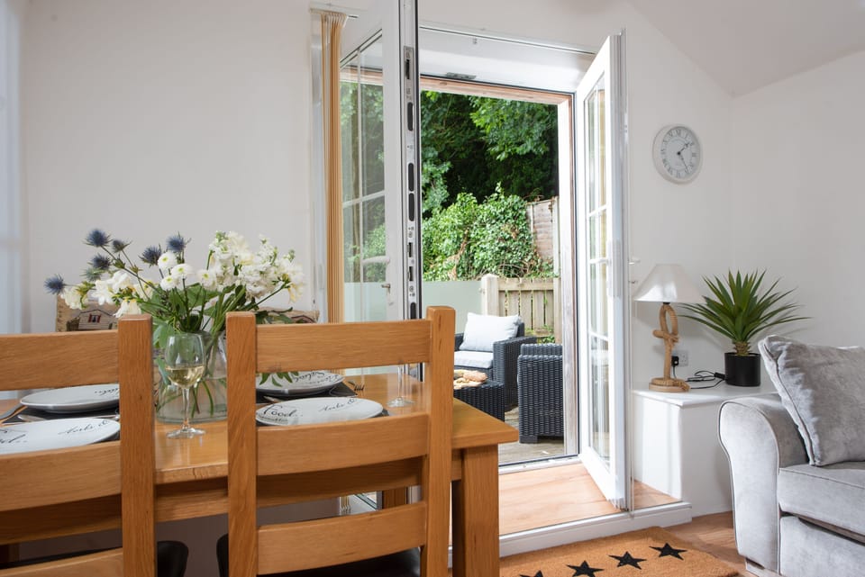 Kerensa, Portreath. First floor: The open-plan living area opens up to the decked balcony