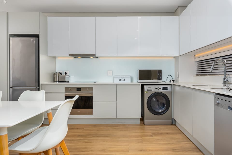 Signature Apartment | Private kitchen | Fridge, microwave, oven, stovetop
