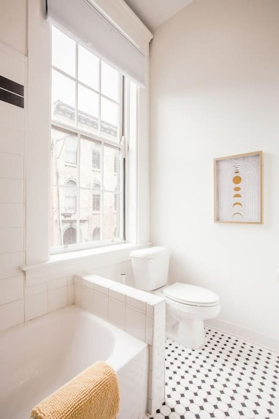 Connected bathroom with bathtub connected to King bedroom