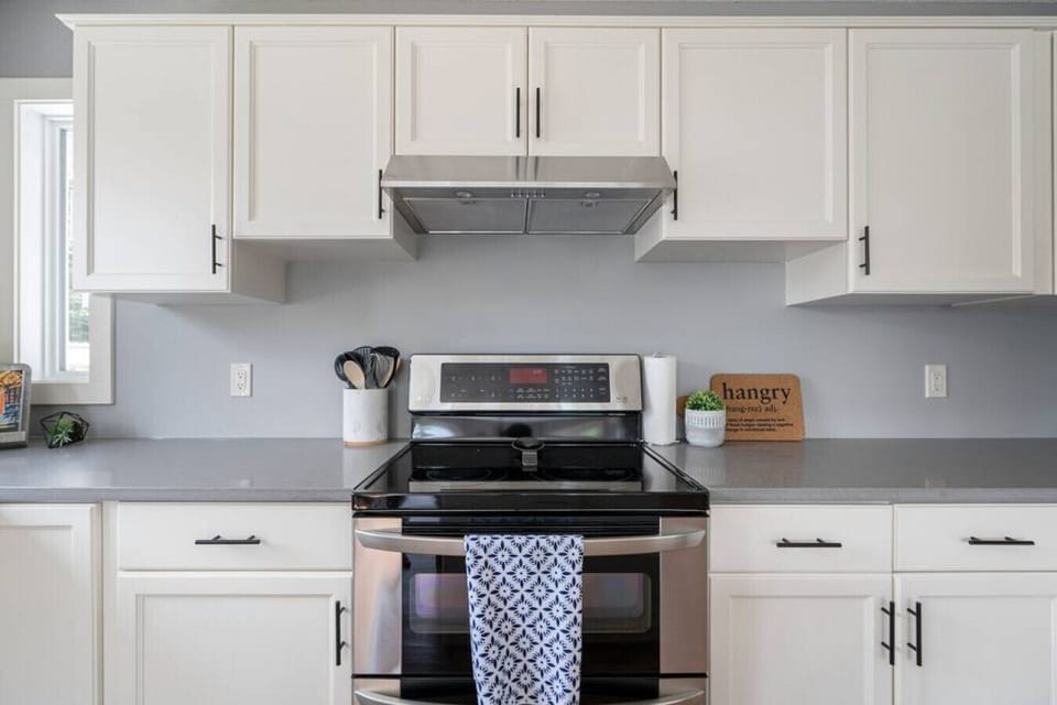 Full kitchen with a drip coffee machine, ground coffee, tea, sugar and basic condiments (ketchup, mustard and relish.)