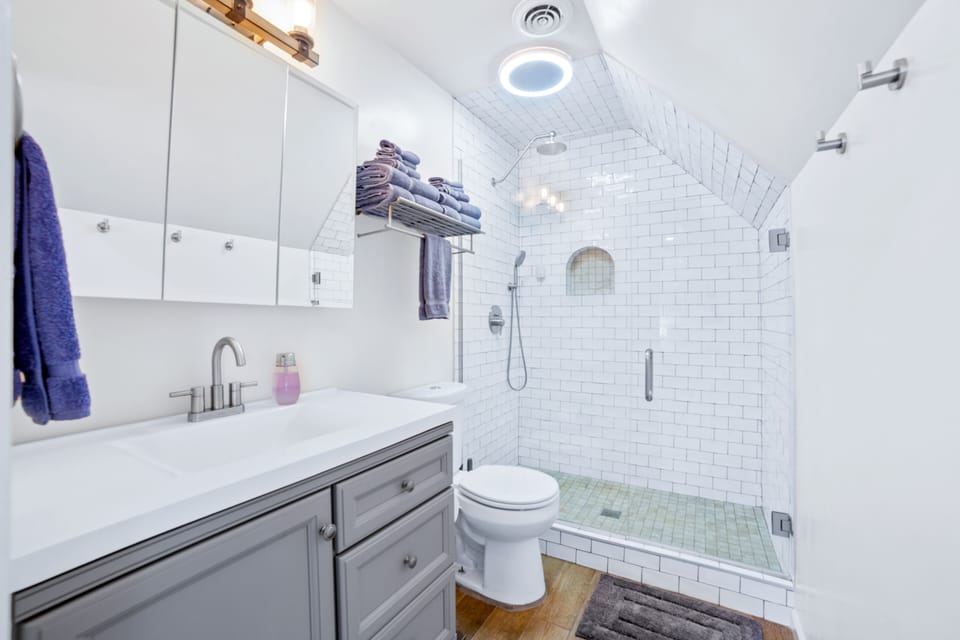 Bathroom 1: Connected to bedroom 1/primary. Walk-in shower.