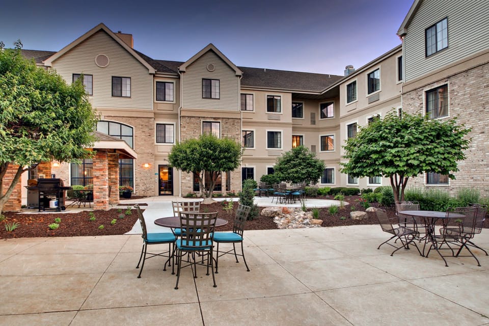 Outdoor courtyard with seating and landscaping
