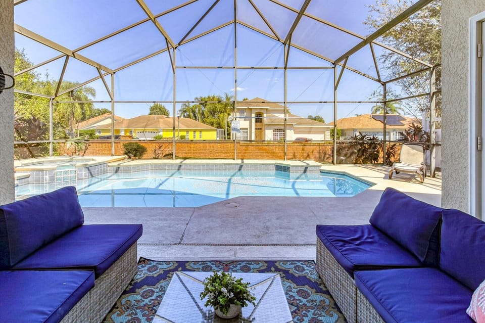 Beautiful patio setting facing our large pool and in ground built spa 