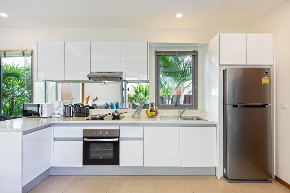 Luxury Villa | Private kitchen | Fridge, microwave, stovetop, dishwasher
