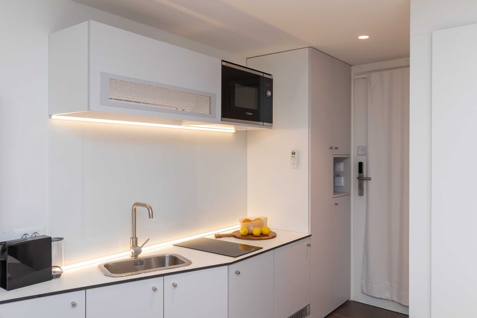 Studio (Studio Apartment) | Private kitchen | Fridge