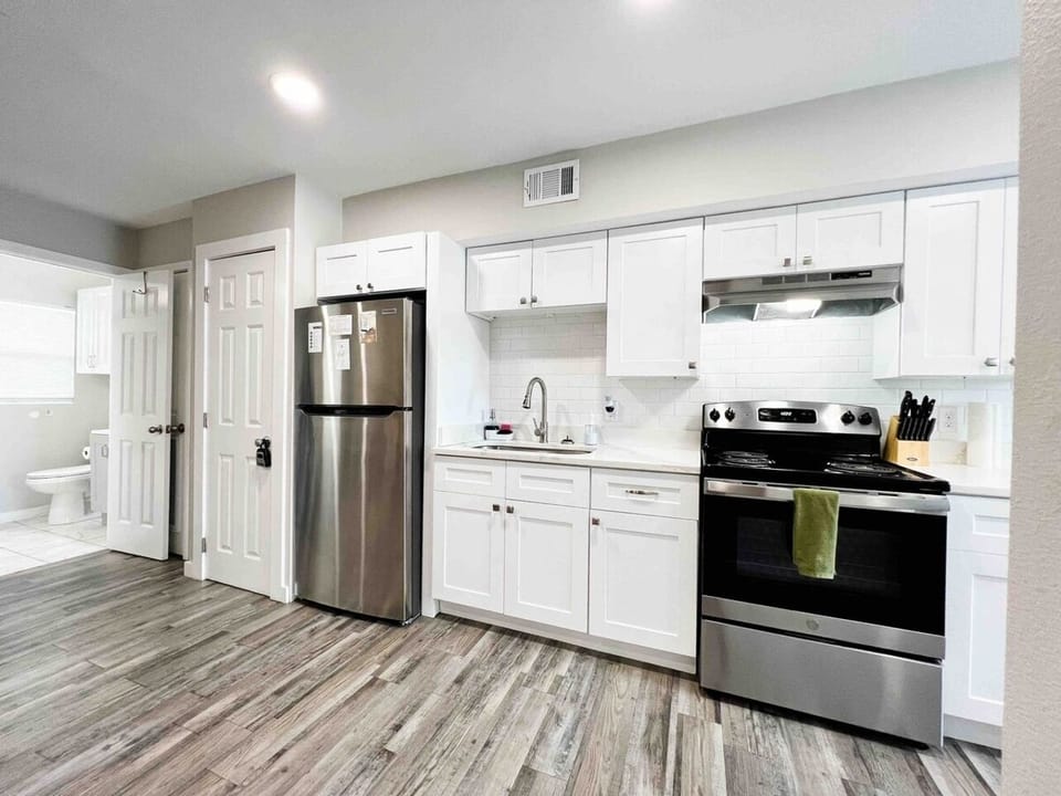 A bright and inviting kitchen that combines functionality with aesthetic appeal.