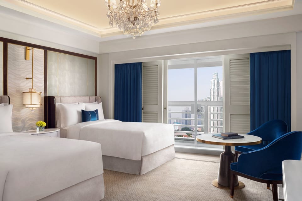 Premium bedding, down comforters, pillowtop beds, minibar