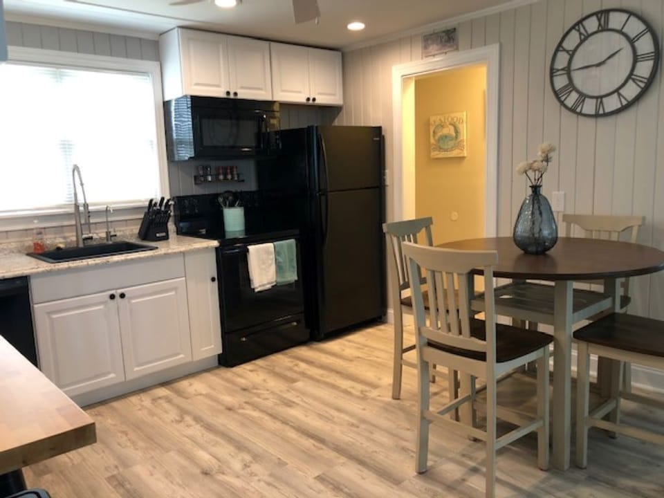 Seating for 4 at a counter height table.