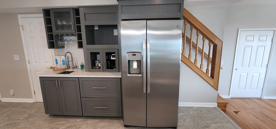 Enjoy a welcome set of starter amenities, including K cups, two rolls of paper towels, trash bags, laundry and dishwasher pods, hand soap, dish soap, kitchen cleaning wipes, and a sponge.