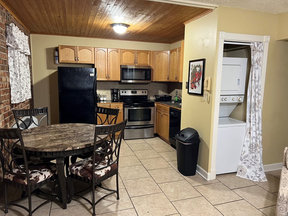 Full kitchen with new appliances and washer and dryer.