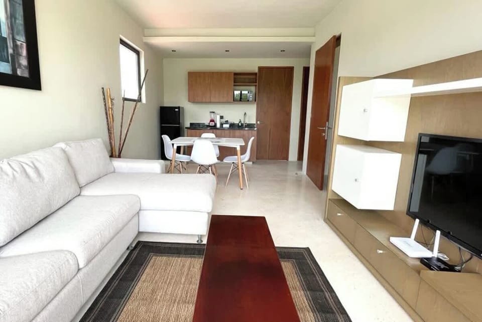 Living room with sofa and smart TV