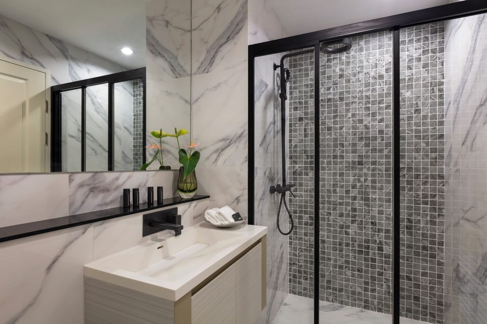 Suite, 2 Bedrooms | Bathroom | Shower, hair dryer, bathrobes, bidet