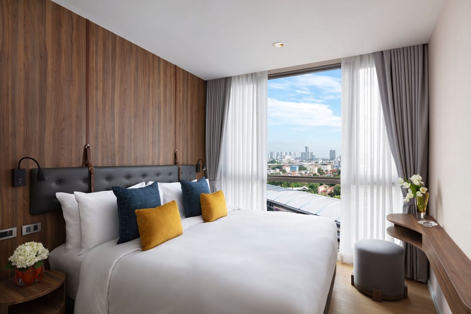 One Bedroom Deluxe King | Premium bedding, desk, soundproofing, iron/ironing board