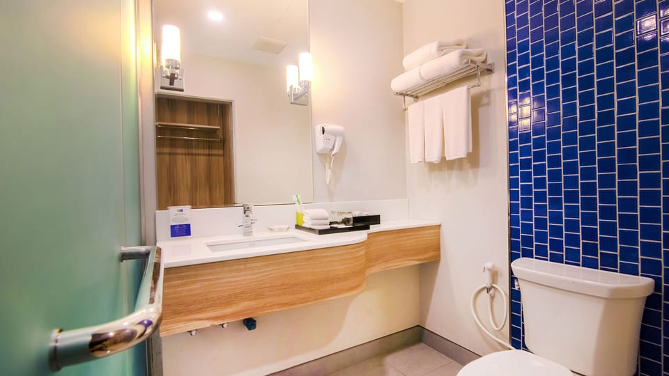 Shower, eco-friendly toiletries, hair dryer, bidet