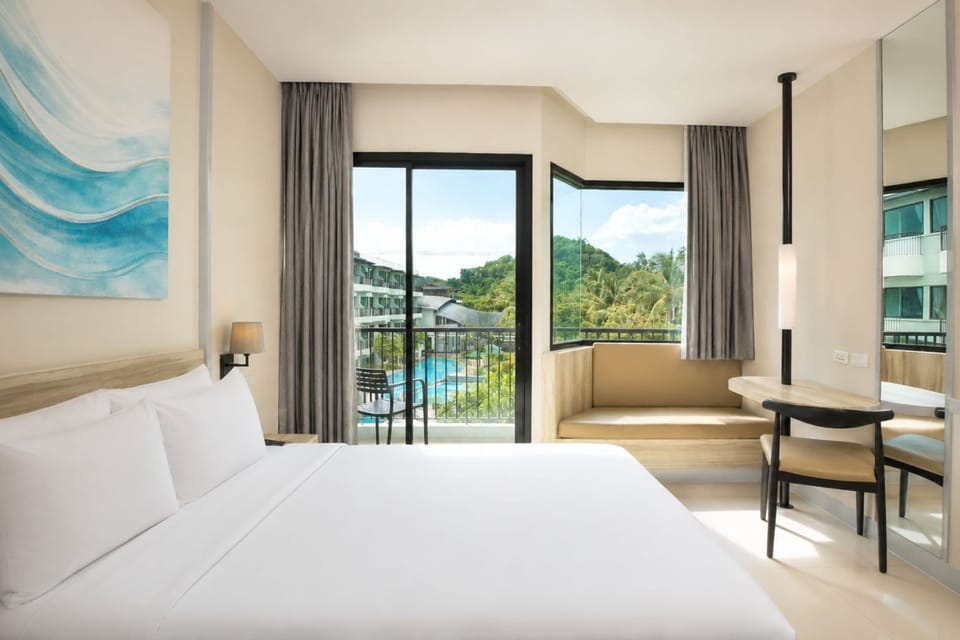 Superior Double or Twin Room, Pool View | In-room safe, desk, laptop workspace, blackout drapes
