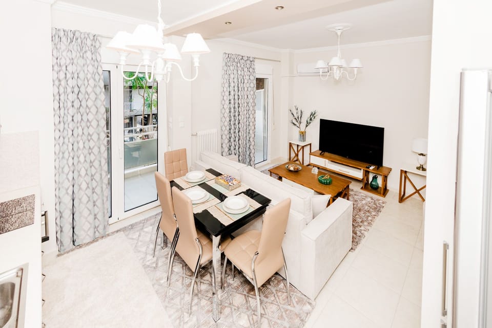 Deluxe Apartment, Multiple Bedrooms, Kitchen, City View | Living area | Flat-screen TV