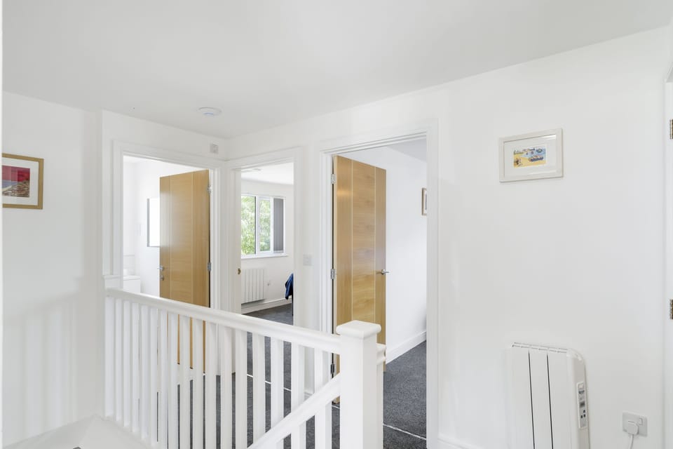 The Cube, Portreath. First floor: The spacious landing which leads on to the two bedrooms, bathroom, kitchen and sitting room