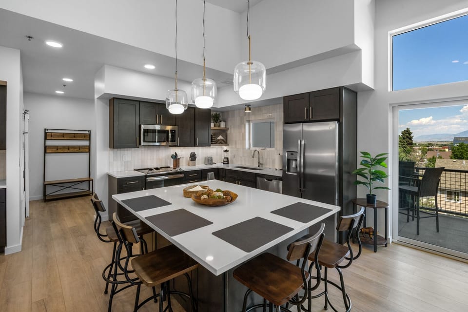Dine at the kitchen island with 4 seats.