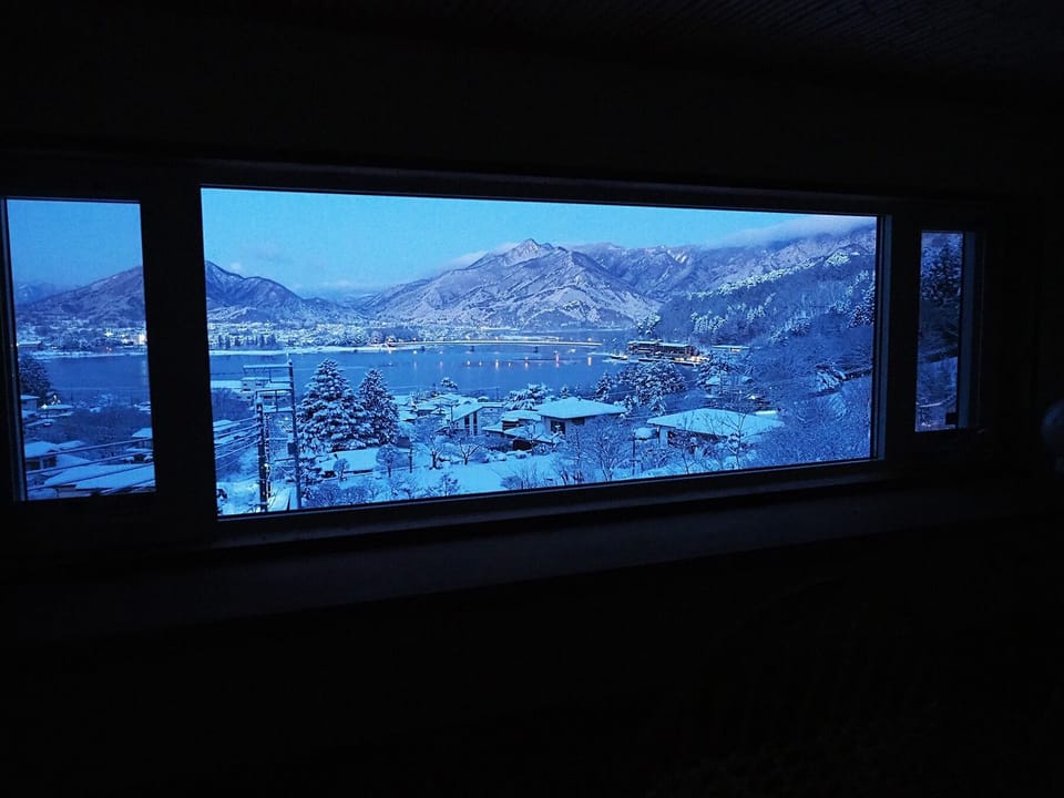 View of the snowy landscape at dawn from the loft.