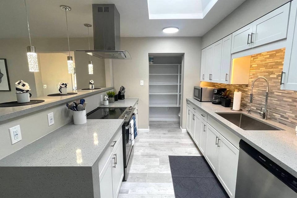 A spacious kitchen to cook a family dinner together.