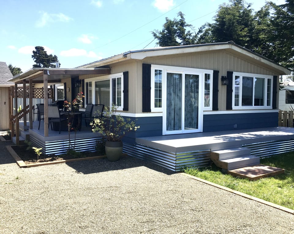 Covered patio with bbq and patio off living room