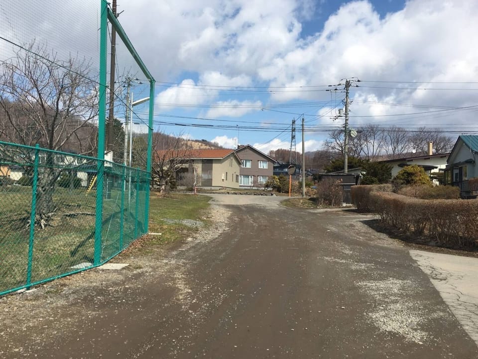 The road where you turn left at the corner of the ground